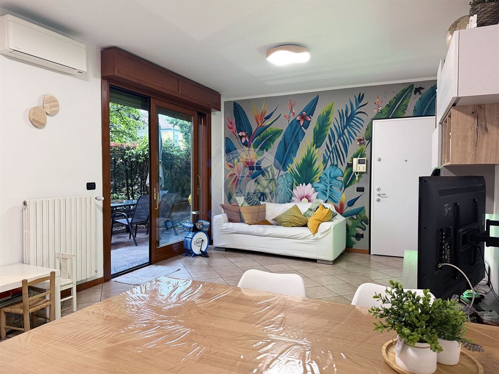 Bilocale arredato con giardino privato e aria condizionata